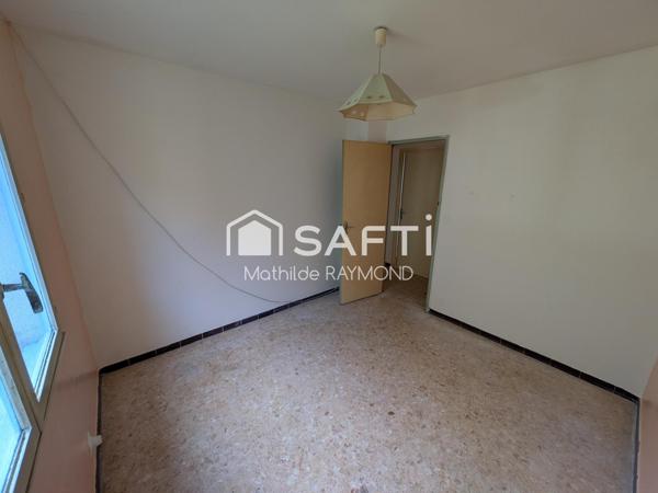 Maisonnette avec du charme et fort potentiel