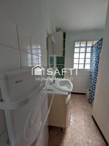 Maisonnette avec du charme et fort potentiel