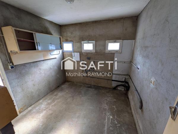 Maisonnette avec du charme et fort potentiel