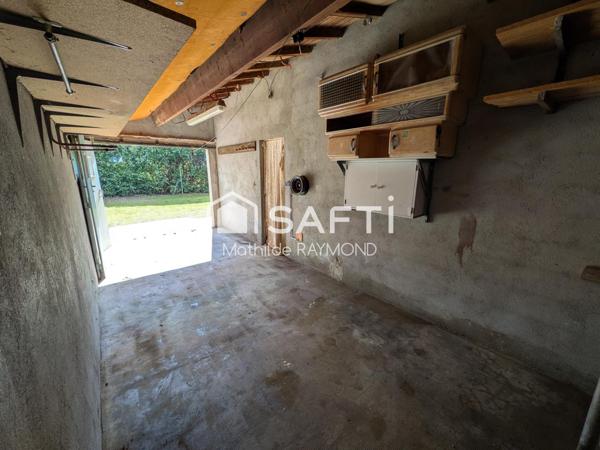 Maisonnette avec du charme et fort potentiel