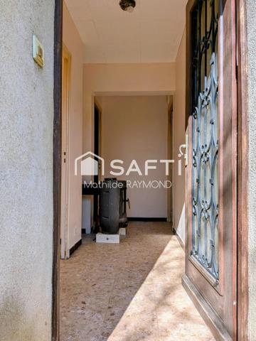 Maisonnette avec du charme et fort potentiel