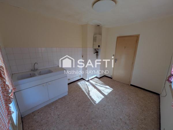 Maisonnette avec du charme et fort potentiel