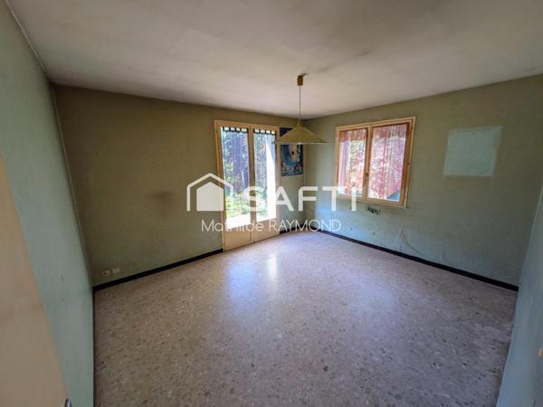 Maisonnette avec du charme et fort potentiel