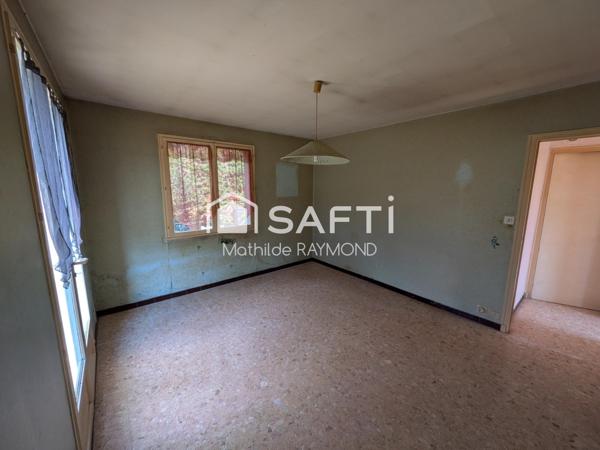 Maisonnette avec du charme et fort potentiel