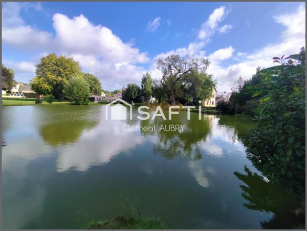 Venez découvrir cette maison pleine de charme, nichée sur un terrain exceptionnel avec son bel étang privatif !