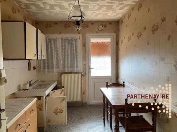 Maison sur sous sol semi enterré