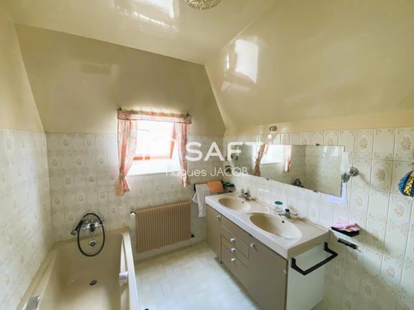 Maison individuelle avec sous complet, jardin bien exposé et 4 chambres