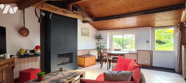 Maison de plain-pied de 60,80 m² et ses dépendances sur un terrain clos d'environ 515 m² 