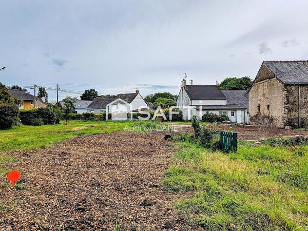Terrain au calme et à distance à pied des commodités