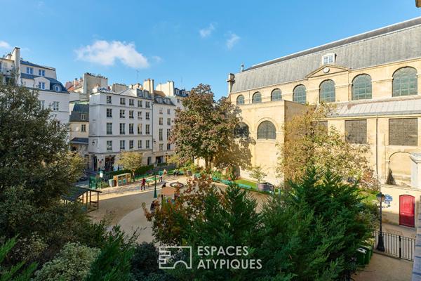 Appartement rénové et vue dégagée sur l’église des Blancs Manteaux