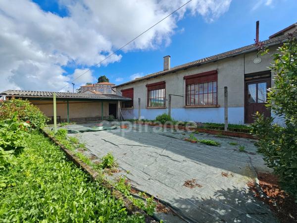 LOFT DE 122 M² AU SOL AVEC JARDIN  à vendre PANISSIERES (42)