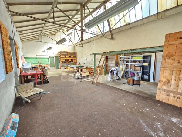 LOFT DE 122 M² AU SOL AVEC JARDIN  à vendre PANISSIERES (42)