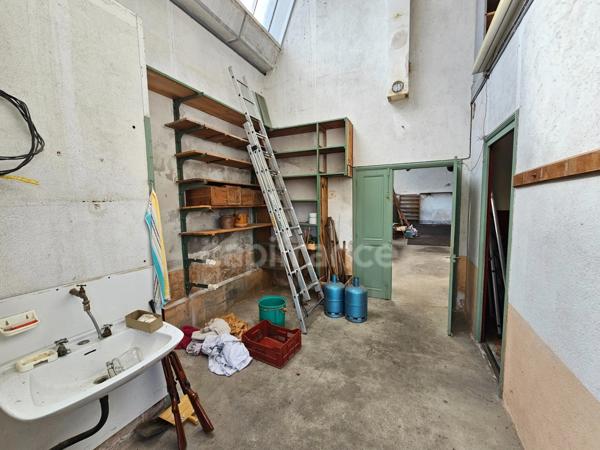 LOFT DE 122 M² AU SOL AVEC JARDIN  à vendre PANISSIERES (42)