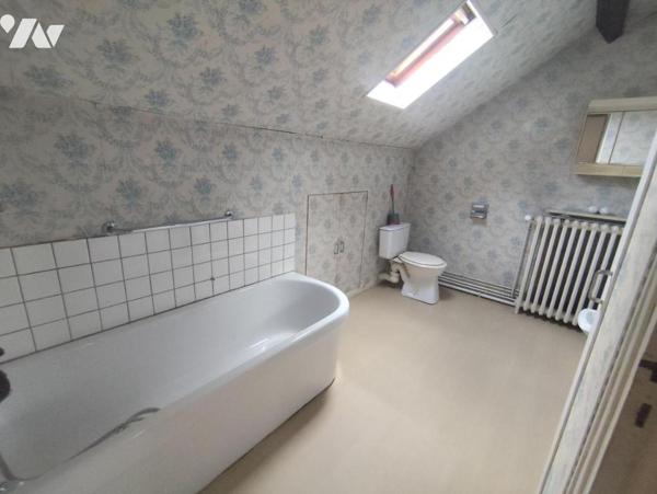 Maison individuelle sur sous-sol avec jardin