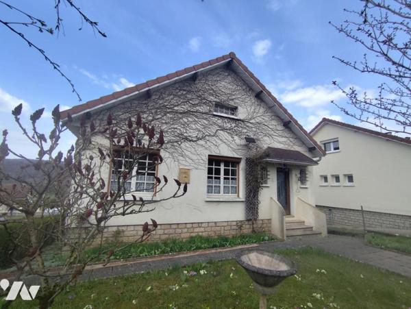 Maison individuelle sur sous-sol avec jardin