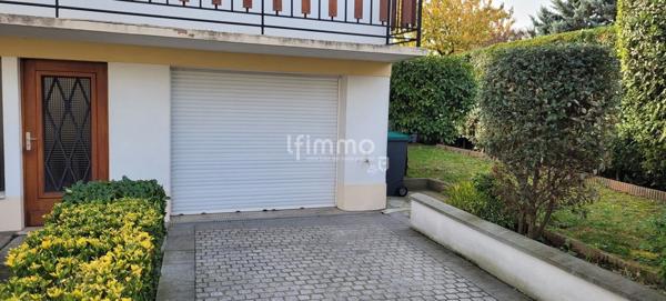 Appartement 4 pièces avec jardin et garage privatif