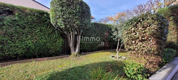 Appartement 4 pièces avec jardin et garage privatif