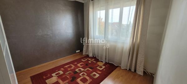 Appartement 4 pièces avec jardin et garage privatif