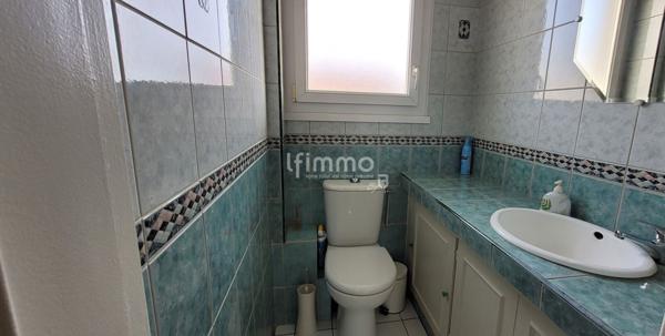 Appartement 4 pièces avec jardin et garage privatif