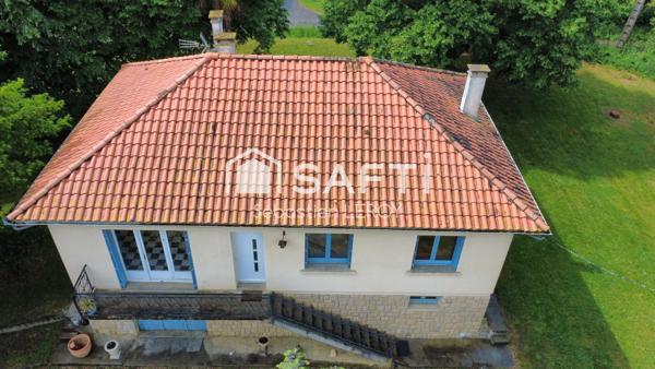 Maison au calme avec grand terrain.