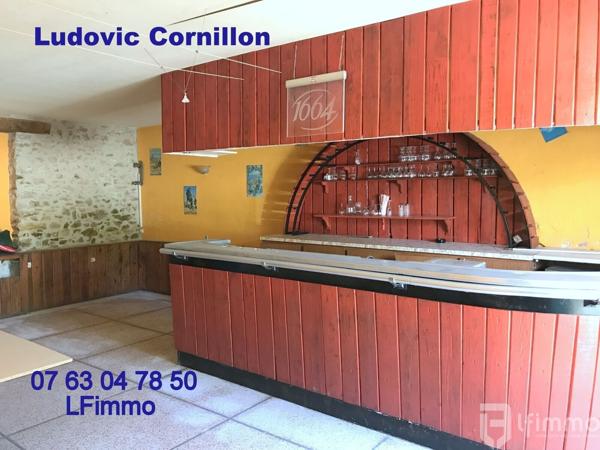 Immeuble : Hôtel-Restaurant, boucherie, appartement à rénover