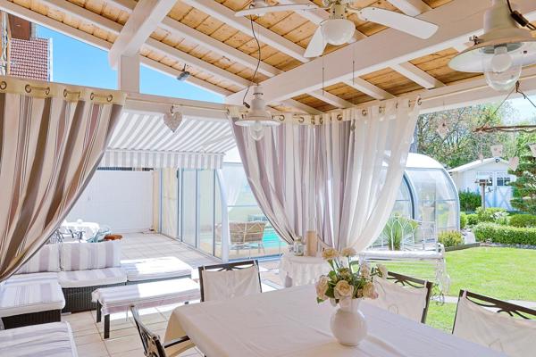 Maison individuelle 147 m² – 4 chambres – Terrain 990 m² – Piscine couverte et chauffée