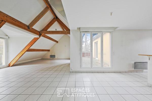 Appartement en duplex avec terrasse et balcon en centre-ville