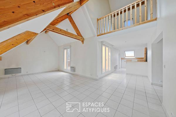 Appartement en duplex avec terrasse et balcon en centre-ville