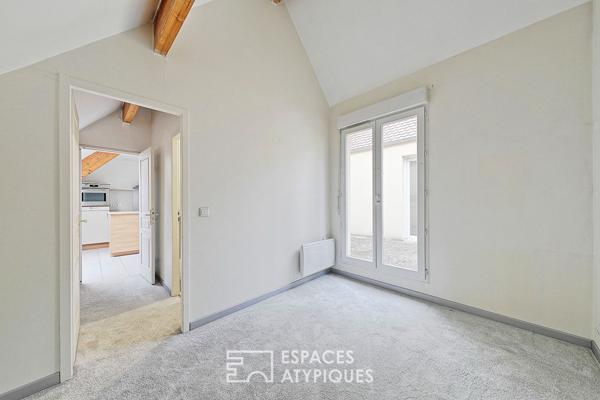 Appartement en duplex avec terrasse et balcon en centre-ville