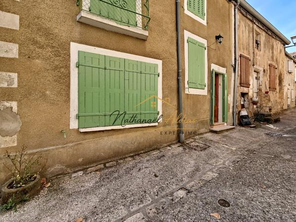 Maison de village avec jardin et caves