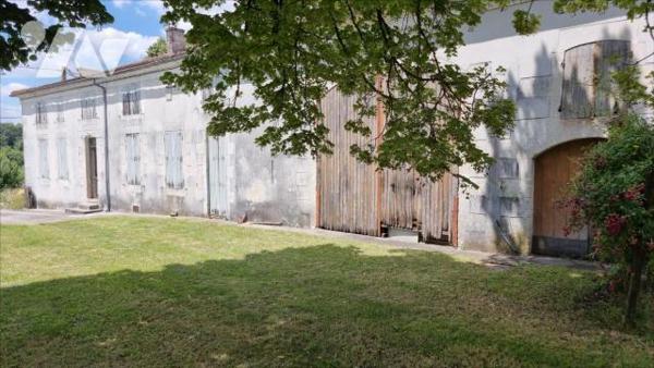 MAISON EN PIERRE INDIVIDUELLE