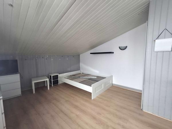 IMMEUBLE AVEC RAPPORT LOCATIF - LOCAL PROFESSIONNEL ET 2 APPARTEMENTS