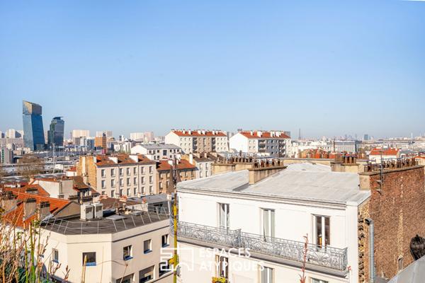 Duplex avec rooftop végétalisé et vue dégagée