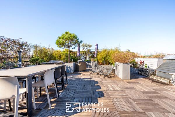 Duplex avec rooftop végétalisé et vue dégagée