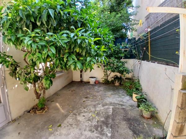 Maison de ville Champs de Mars avec garage, terrasse, patio
