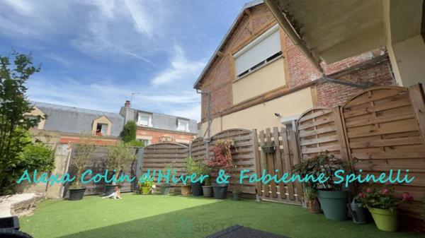 Duplex avec terrasse et garage proche centre ville