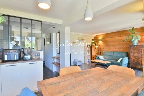 Magnifique appartement T4 rénové avec terrasse, vue lac et parking