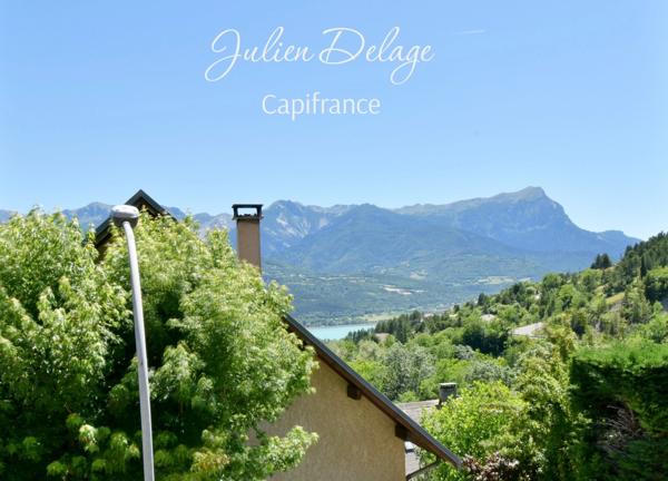 Magnifique appartement T4 rénové avec terrasse, vue lac et parking