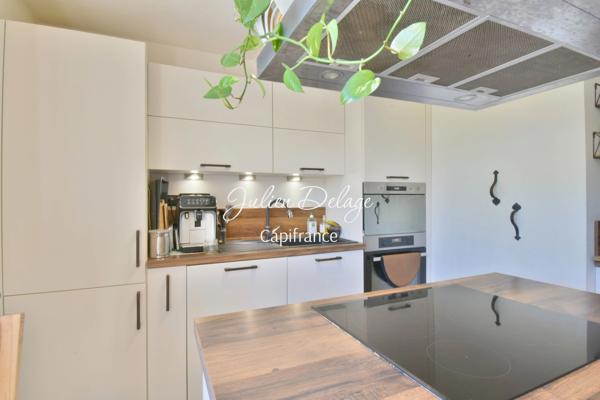 Magnifique appartement T4 rénové avec terrasse, vue lac et parking