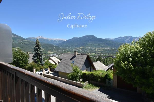 Magnifique appartement T4 rénové avec terrasse, vue lac et parking
