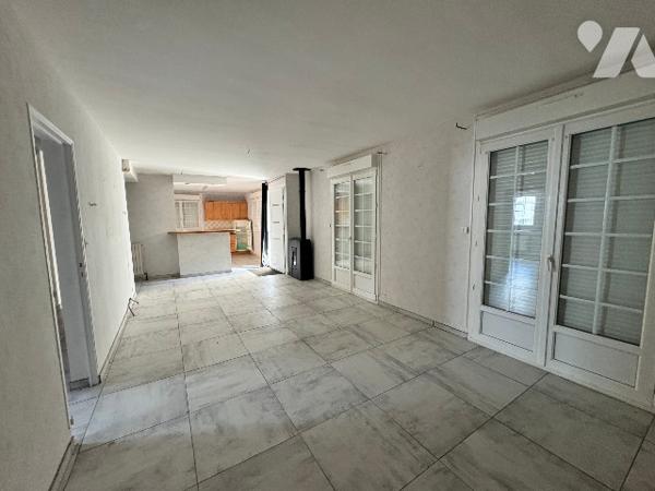 Ensemble immobilier avec extension récente et grange en pierres – fort potentiel