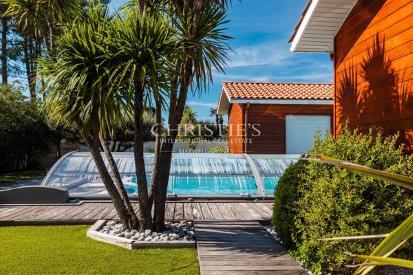 BISCARROSSE : Villa d’architecte ossature bois avec piscine et jardin