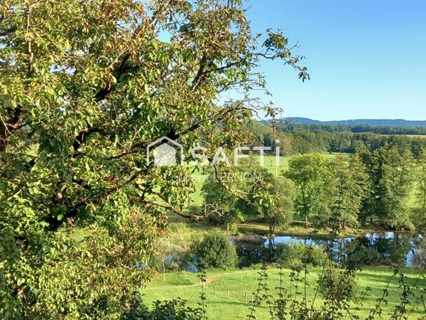 MAISON DE CAMPAGNE AU BORD DE L'EAU