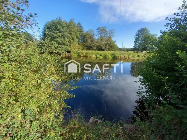 MAISON DE CAMPAGNE AU BORD DE L'EAU