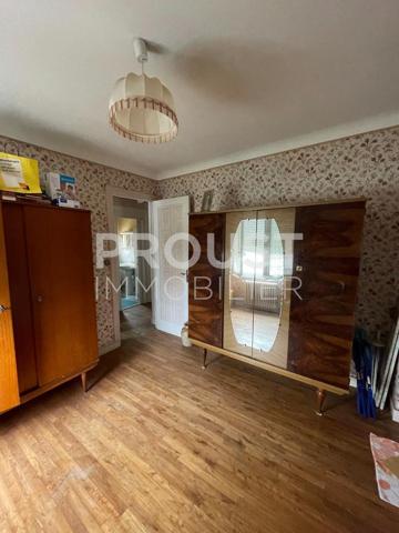Viager, quartier quai métayer, maison mitoyenne, 3 chambres, jardin , garage.