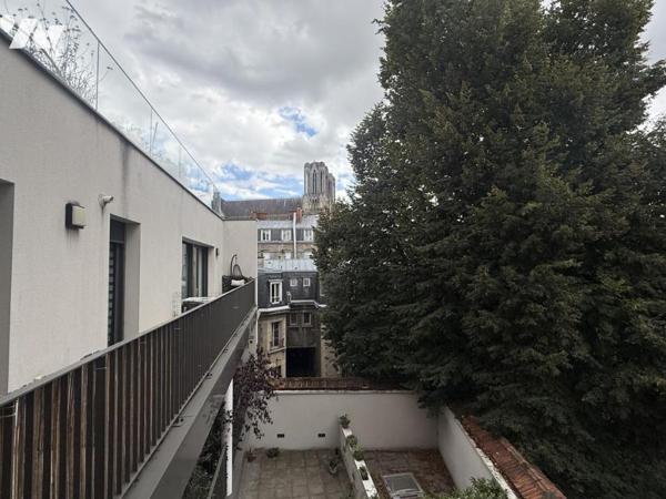 EXCLUSIVITE -REIMS rue de l'Ecu- T2 78,80m² + Loggia de 7m²-  Box fermé double