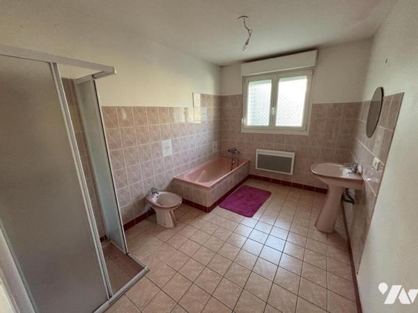 Appartement T3 au RDC (environ 98 m² habitables) avec garage - secteur calme (proche frontière)