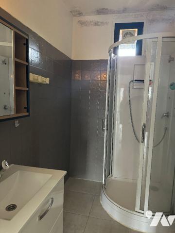 Pavillon avec garages proche du centre ville