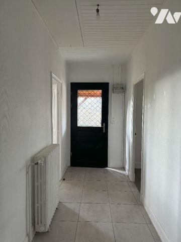 Pavillon avec garages proche du centre ville