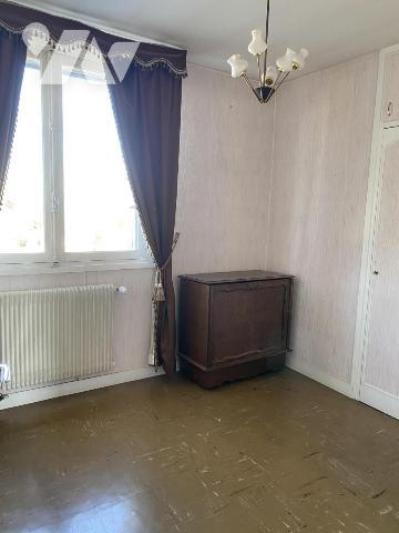 CENTRE-VILLE UN APPARTEMENT 4 PP AVEC CAVES - GRENIER ET GARAGE